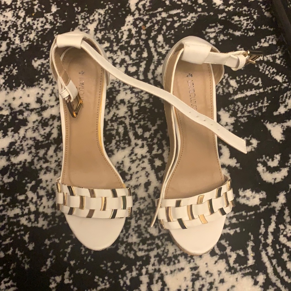 High white and gold rope wedges .